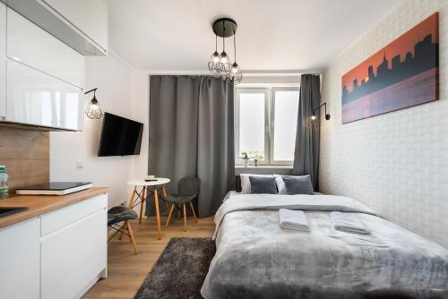 Posteľ alebo postele v izbe v ubytovaní City Centre High Floor View Apartments