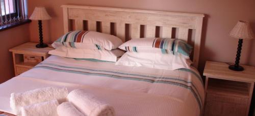 Posteľ alebo postele v izbe v ubytovaní Herolds Bay Accommodation - Bergwater Downstairs