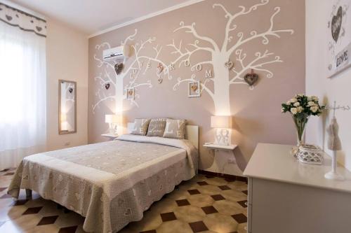 A bed or beds in a room at ClickSardegna Villa Emanuel ad Alghero con Vista mare spettacolare, piscina indipendente per 8 persone