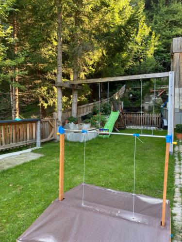 a trampoline in the middle of a yard at Ferienwohnung Schiestl in Zell am Ziller