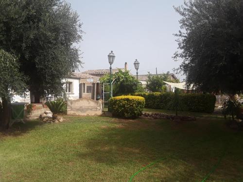 Κήπος έξω από το Aranceto Hotel