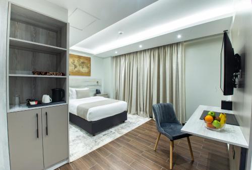 Ein Bett oder Betten in einem Zimmer der Unterkunft Hotel Mokka City