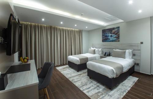 Ein Bett oder Betten in einem Zimmer der Unterkunft Hotel Mokka City