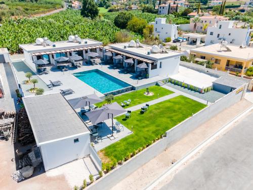 an aerial view of a house with a swimming pool at Antesia Coral Bay Resort by Ezoria Villas - Adults only in Coral Bay