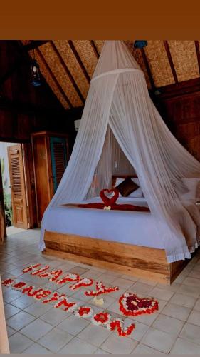 Кровать или кровати в номере Gladak di Uma Bali