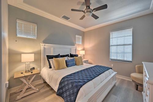 a bedroom with a bed and a ceiling fan at Lely Resort Condo about 10 Mi to Naples Beach! in Lely Resort