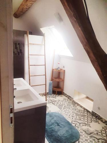 Ένα ή περισσότερα κρεβάτια σε δωμάτιο στο Chambres d'hôtes Gourdon