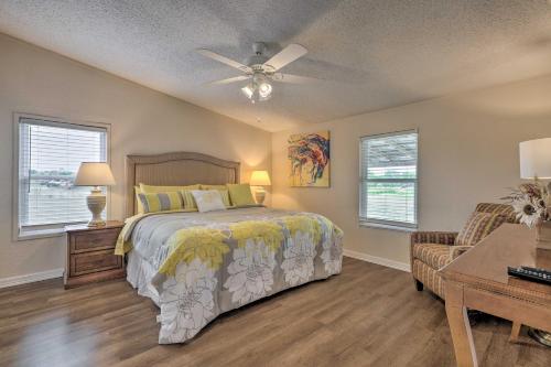 a bedroom with a bed and a ceiling fan at Family-Friendly San Marcos Home Close to TSU! in San Marcos