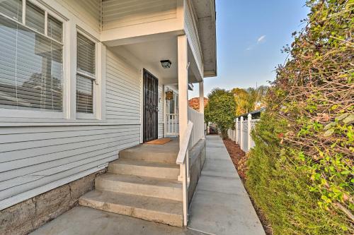 a white house with stairs leading to a door at Updated Poway Farmhouse Walk to Parks! in Poway
