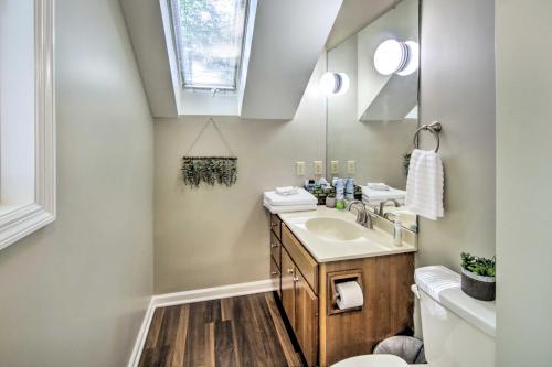 a bathroom with a sink and a mirror at Peaceful Nashville Hideaway Near State Parks! in Nashville