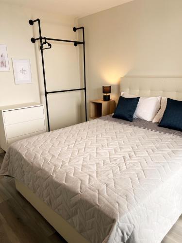 Ένα ή περισσότερα κρεβάτια σε δωμάτιο στο Dona I Apartments at Botanical Garden