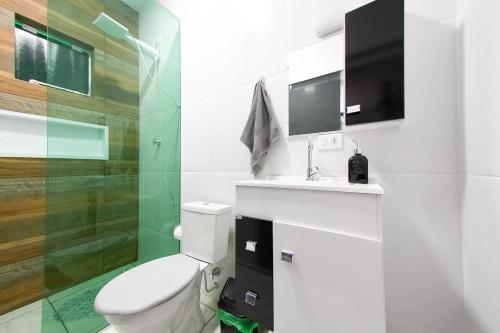 Ένα μπάνιο στο Pousada Loft Enseada Beach a 200mt da praia