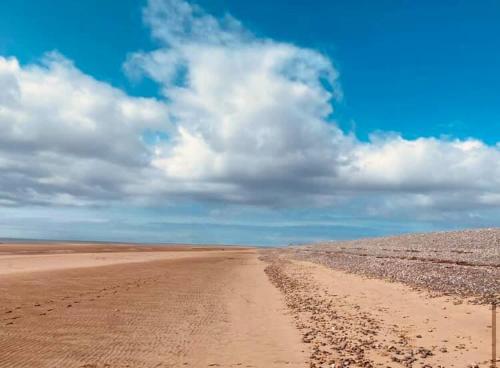 a dirt road in the middle of a desert at Tranquility No 42 Port Haverigg Marina in Millom