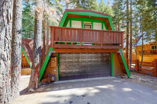 a garage with a balcony on top of it at Chapel Grove in Tahoe City