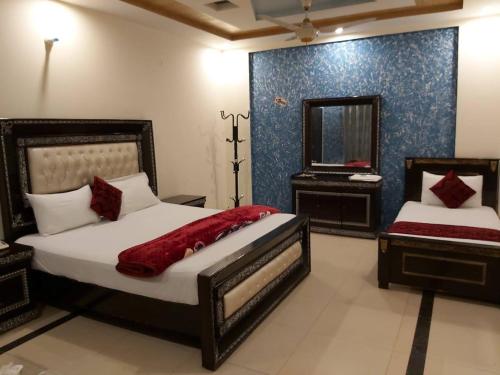 Ένα ή περισσότερα κρεβάτια σε δωμάτιο στο Hotel Visit Inn One