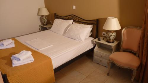 Ένα ή περισσότερα κρεβάτια σε δωμάτιο στο Apagio Apartments