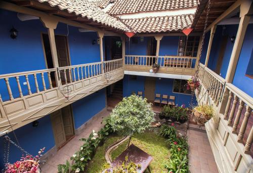 a building that has some stairs leading up to it at Tambo del Arriero Hotel Boutique in Cusco