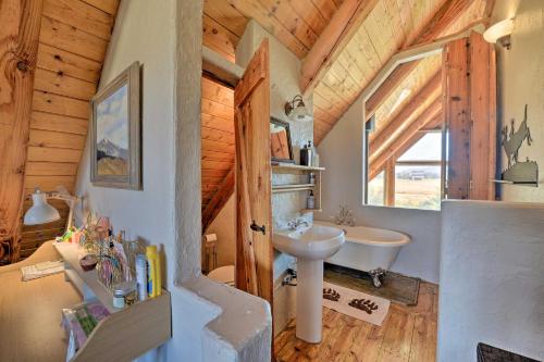 a bathroom with a sink and a toilet in a house at Stunning Driggs Retreat with Private Hot Tub and Pond! in Driggs
