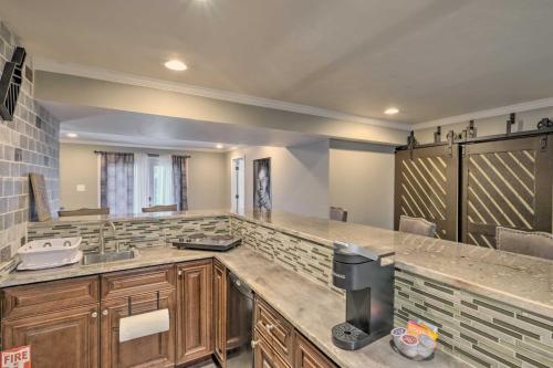 a kitchen with a sink and a counter top at Cozy Waldorf Guest Suite Near Potomac River! in Waldorf