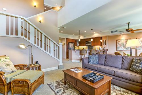 a living room with a couch and a table at Castle Hali'i Kai at Waikoloa in Waikoloa