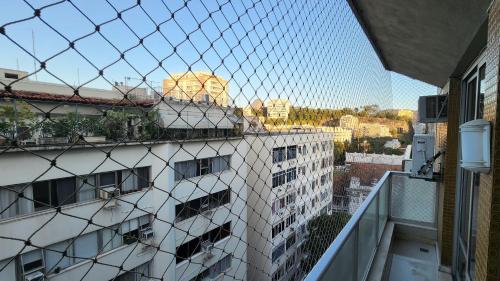a view of a building from a balcony at Nader Home's - 3 quartos Laranjeiras in Rio de Janeiro