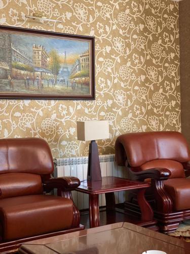 a waiting room with two chairs and a table at Orsetto in Sevan