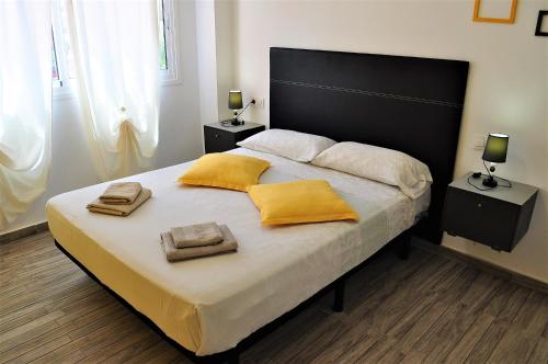 Postel nebo postele na pokoji v ubytování Cris Sol Apartments