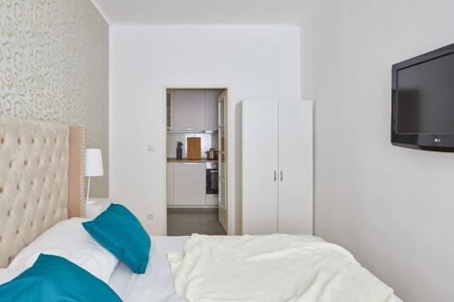 Postel nebo postele na pokoji v ubytování Gentle and cozy apartment right at the Center Prague