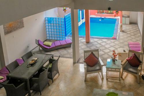 an overhead view of a living room with a pool at 5 Bedroom Holiday Villa - Kuta Regency B8 in Kuta