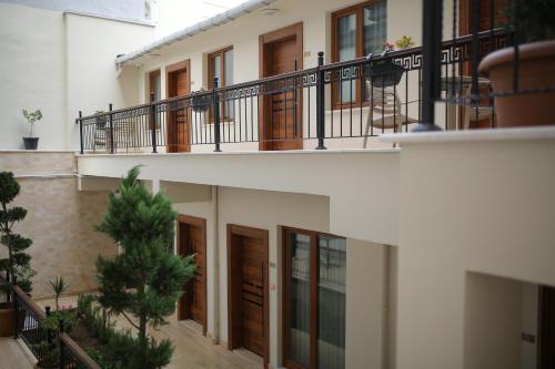 a building with two balconies and a courtyard at HaciBayramHotel in Istanbul