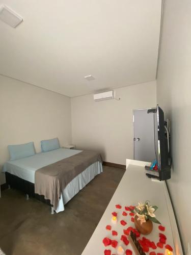 Postel nebo postele na pokoji v ubytování Pousada Cristal Dourado