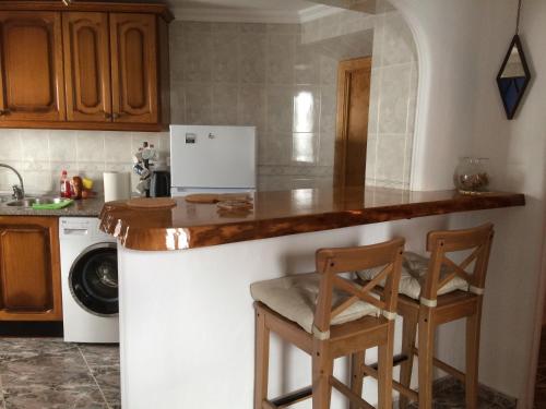 Η κουζίνα ή μικρή κουζίνα στο Casa de las Flores - a picture perfect location!