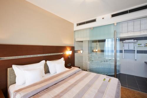 Cama o camas de una habitación en IN Hotel Beograd