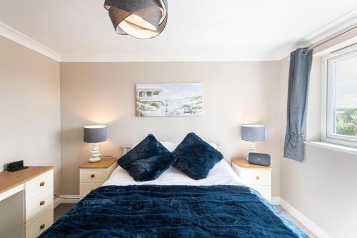 Posteľ alebo postele v izbe v ubytovaní Newly renovated 2 bed house with large garden.