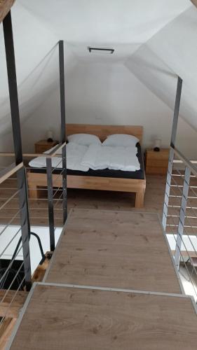 a bedroom with a bed in a attic at Meyer Holiday 