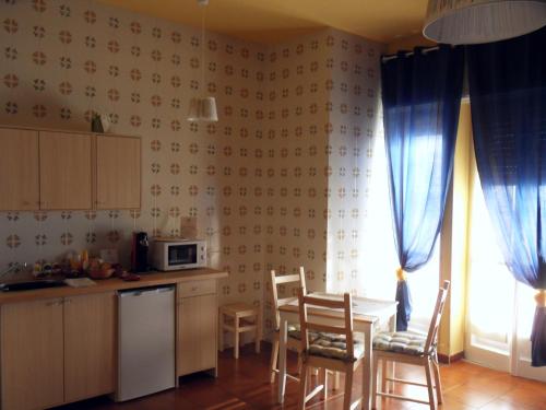 A kitchen or kitchenette at Leucosia Bed & Breakfast