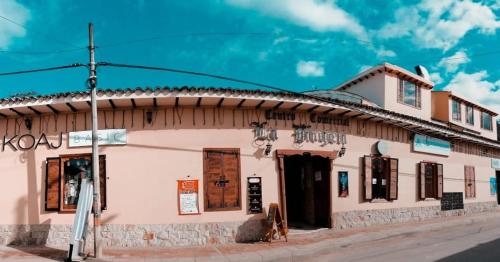 a building on the side of a street at HOTEL BS in Nemocón