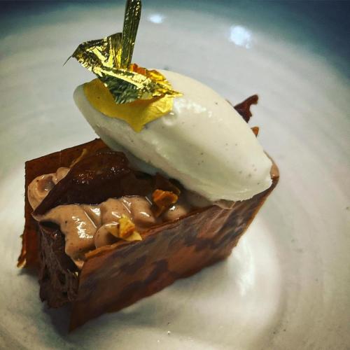 a piece of food on a white plate at Grays Court Hotel in York