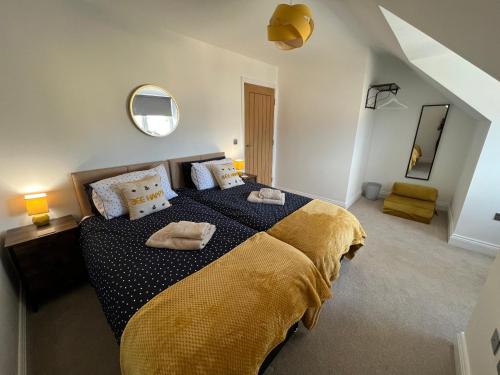 Postel nebo postele na pokoji v ubytování DAIRY COTTAGE WHITBY