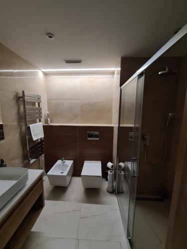 Kúpeľňa v ubytovaní Akvamarín Bešeňová apartmán