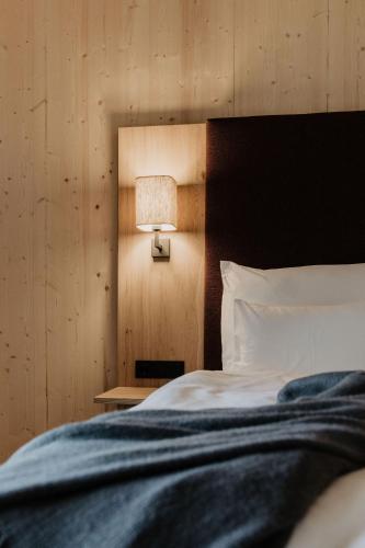 Кровать или кровати в номере Landhaus Saalbach - Joker card included in summer