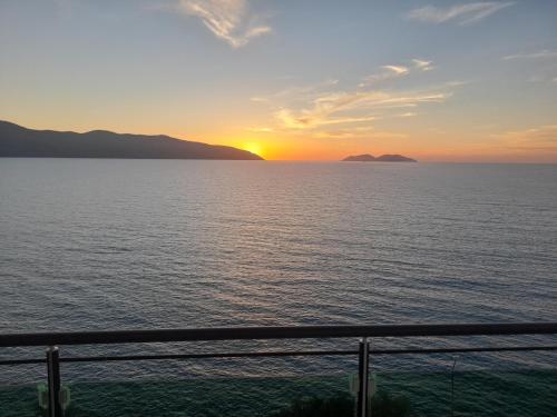 a view of the sunset from a cruise ship at The Blue Horizon in Vlorë