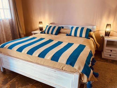 Posteľ alebo postele v izbe v ubytovaní Hostal Katari
