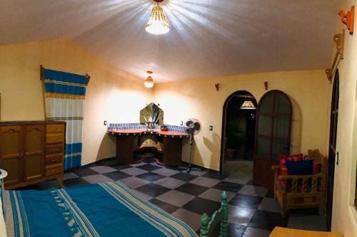 Postel nebo postele na pokoji v ubytování Casa Carmín en Teotitlán