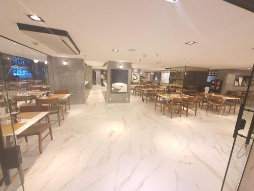 En restaurant eller et andet spisested på Flat Lets Idea Brasília Hotel By Rei dos Flats