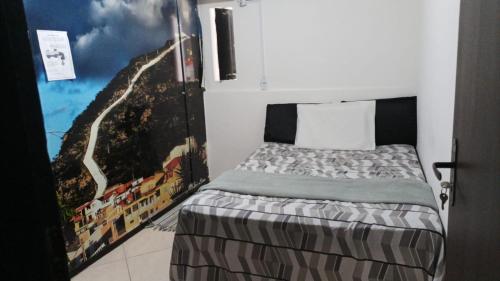 Ένα ή περισσότερα κρεβάτια σε δωμάτιο στο Hostel portal do sol