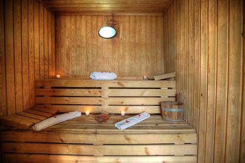 a wooden sauna with candles in it with at Casablanca Le Lido Thalasso & Spa (ex Riad Salam) in Casablanca
