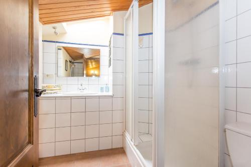 a bathroom with a sink and a mirror at Turismo Rural Can Massot in Darnius