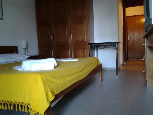 A bed or beds in a room at Studios Adriatico