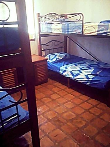 Postel nebo postele na pokoji v ubytování Villa Vacacionales Los Cayos Con Playa Privada